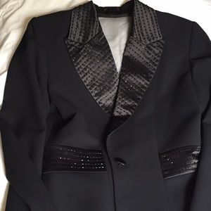 Formal jacket and satin pants.